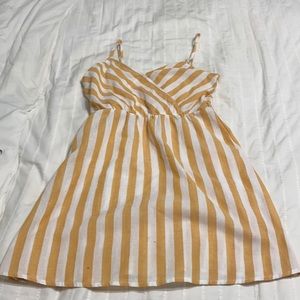I’m selling a mustard and white dress, I only have worn it once.